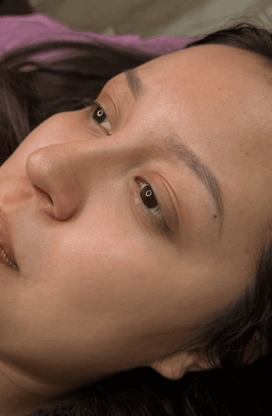 Ombre powder brows healed after the first session, showing the softer settled color