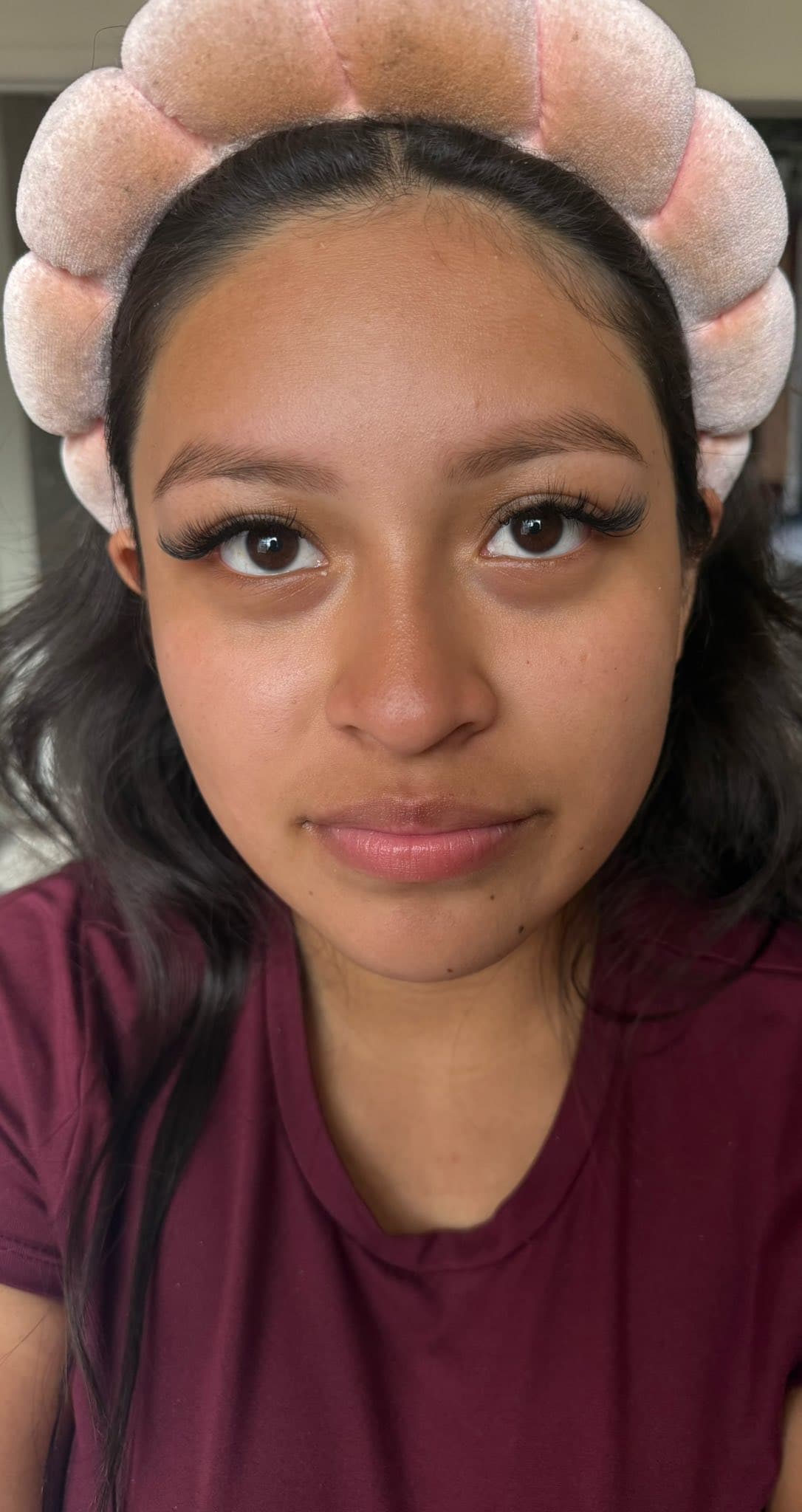 Quinceañera soft-glam result showing smooth, camera-ready skin prep